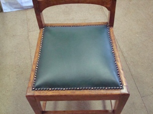 Leather studded pin cushion chair