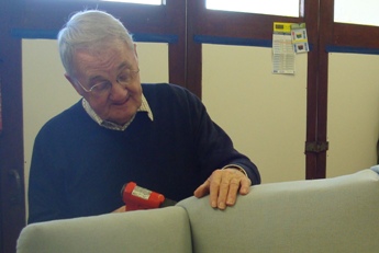 Attaching top cover to small fireside chair